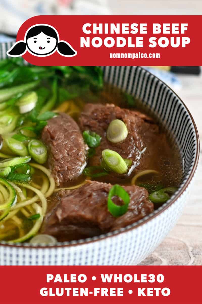 A closeup shot of a blue bowl filled with paleo, Whole30, and keto Chinese beef noodle soup.