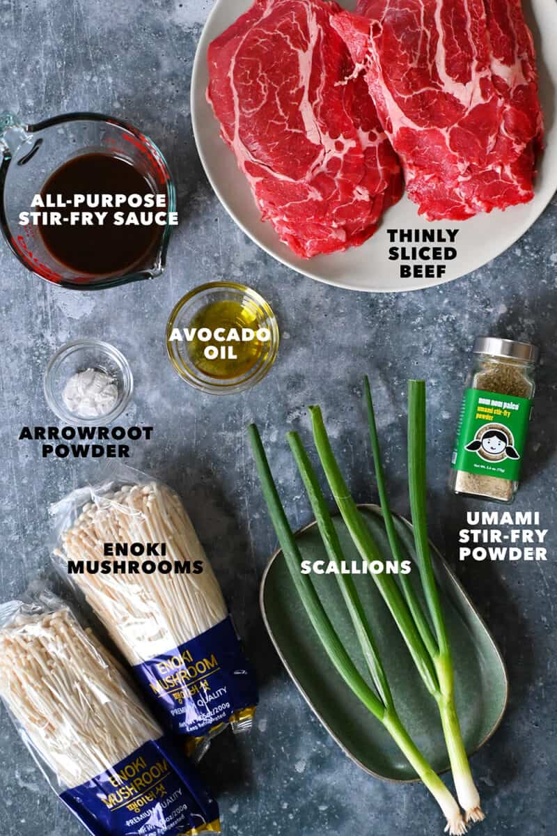 The raw ingredients to make paleo, Whole30, gluten free, and keto beef and enoki mushroom rolls