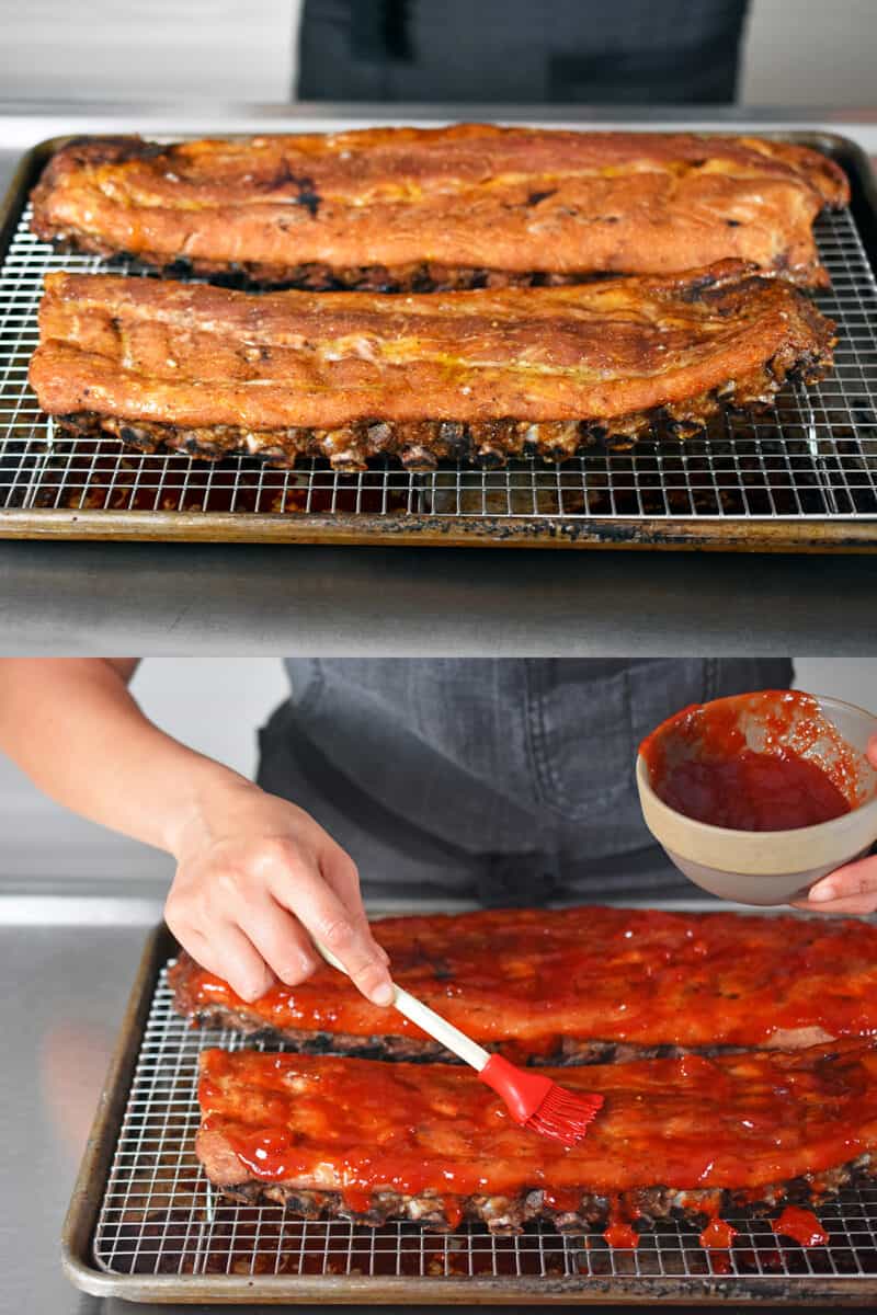 Brushing the barbecue sauce on the oven baked baby back ribs.