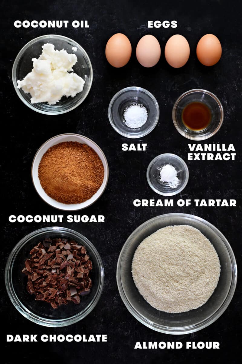 An overheard shot of the raw ingredients to make paleo Torta Caprese, an Italian almond flour chocolate cake.