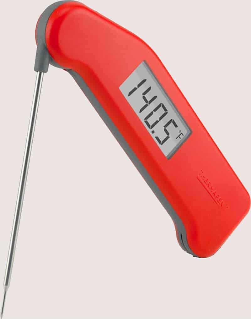 A red Thermapen One instant read thermometer with the probe pulled out.