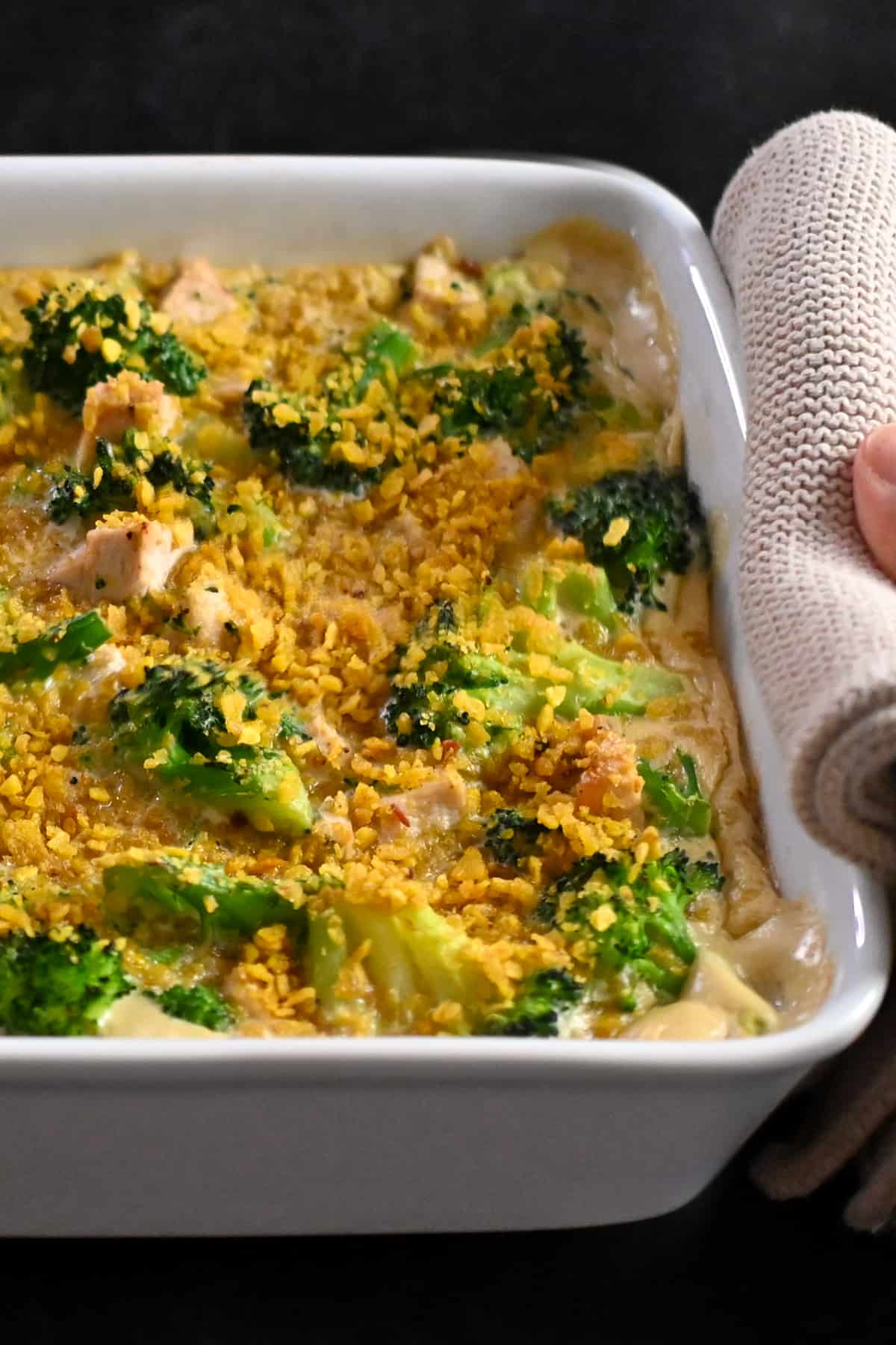 A closeup of the right side of a baked paleo chicken divan casserole. 
