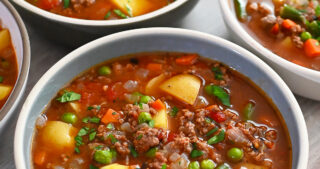 An overhead shot of two bowls of paleo and Whole30 hamburger soup.