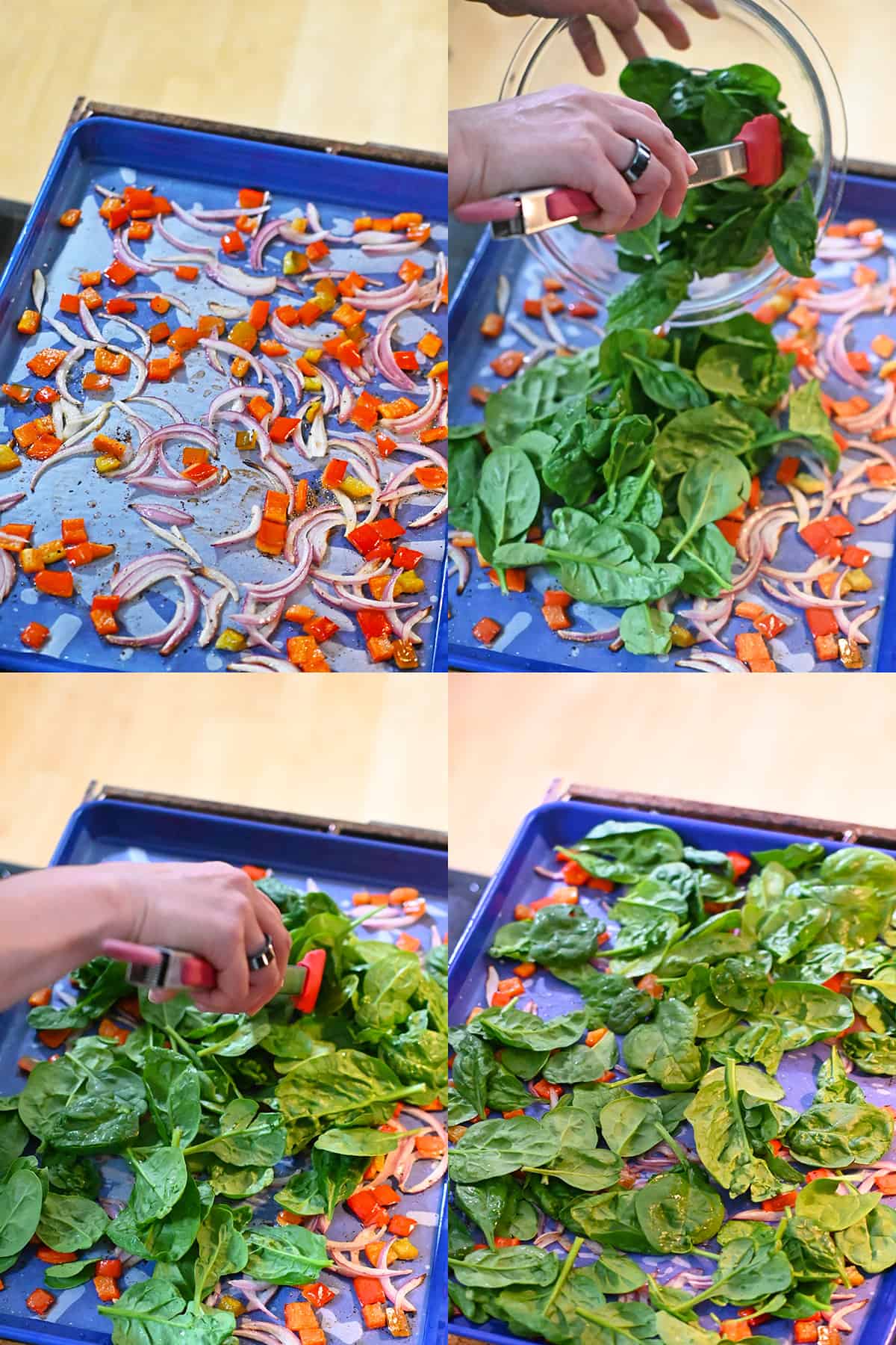 Four shots of someone adding baby spinach to a blue sheet pan with roasted sliced red onions and diced bell peppers and tossing everything with a pair of tongs.