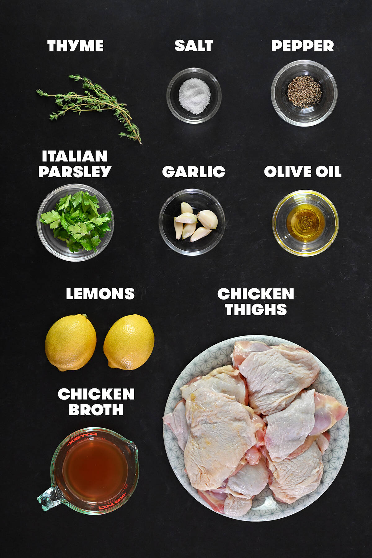 An overhead shot of the raw ingredients to make lemon garlic chicken.