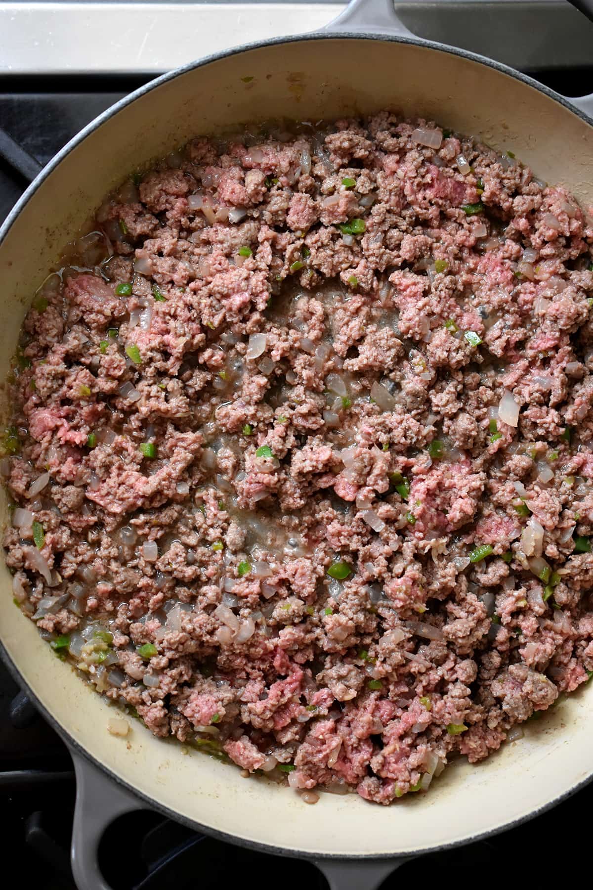An overhead shot of the meat filling of a paleo Indian-spiced shepherd's pie.