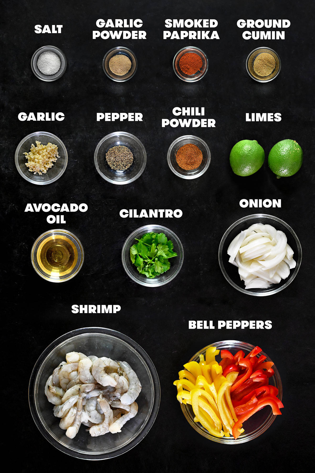 An overhead shot of the raw ingredients to make shrimp fajitas.